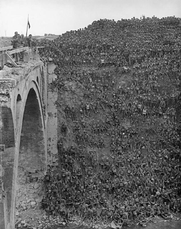Brigadier General J V Campbell addressing troops of the 137th Brigade (46th Division) from the Riqueval Bridge over the St Quentin Canal in 1918.