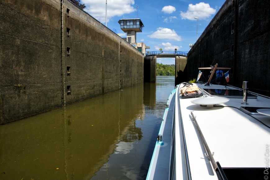 The lock gates open on the River Moselle.
